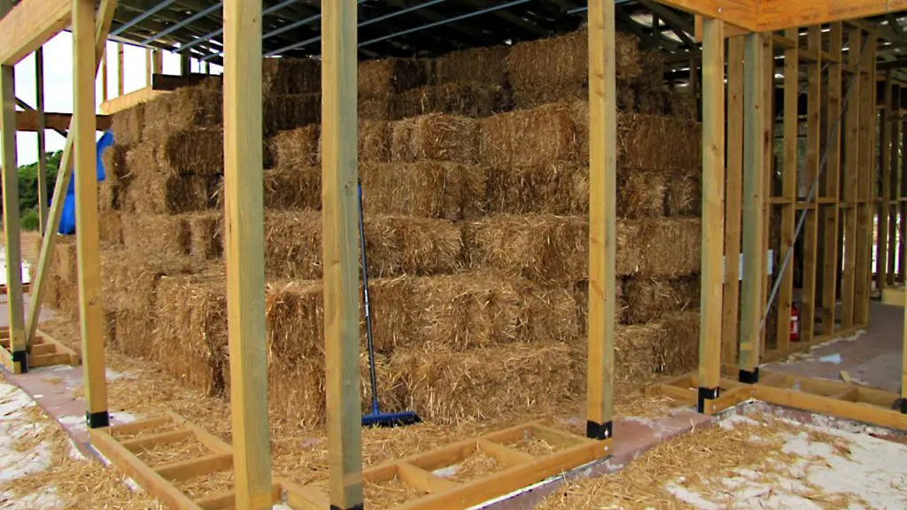 insulating compost pile with straw bales