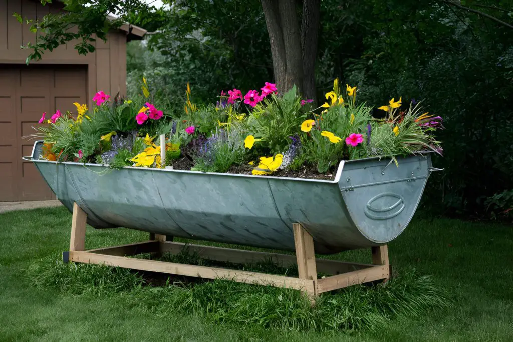 old cattle feeder turned into a raised bed